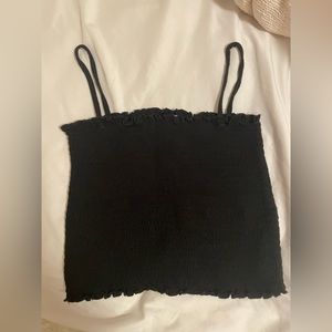 Black cami top with straps that can be tucked in